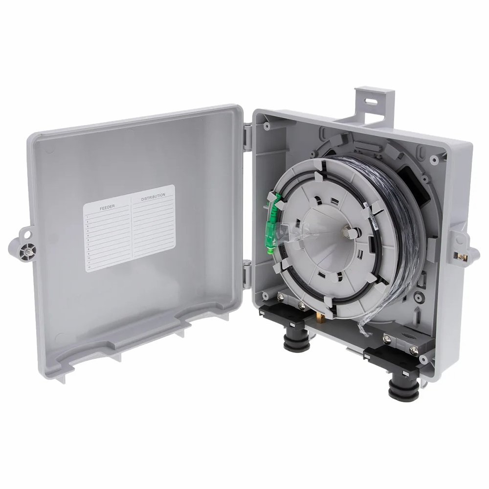 NID Box Splice Management – Fiber Tray & Routing Layout Inside view of outdoor fiber NID box showing splice tray and fiber routing for splice termination in FTTH outdoor applications